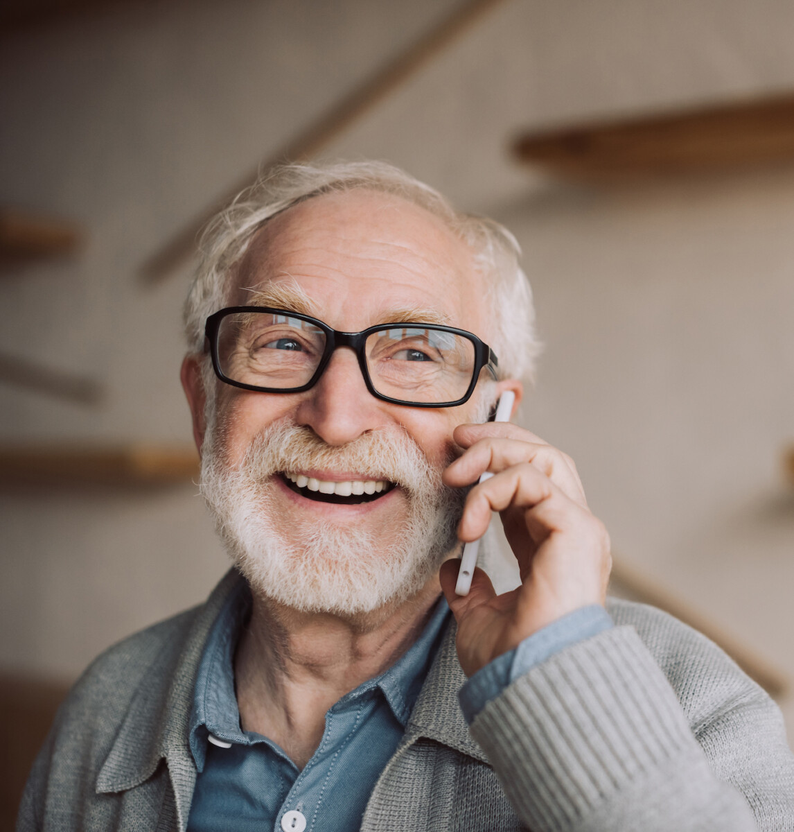 Older Man on the phone asking questions about a roof replacement