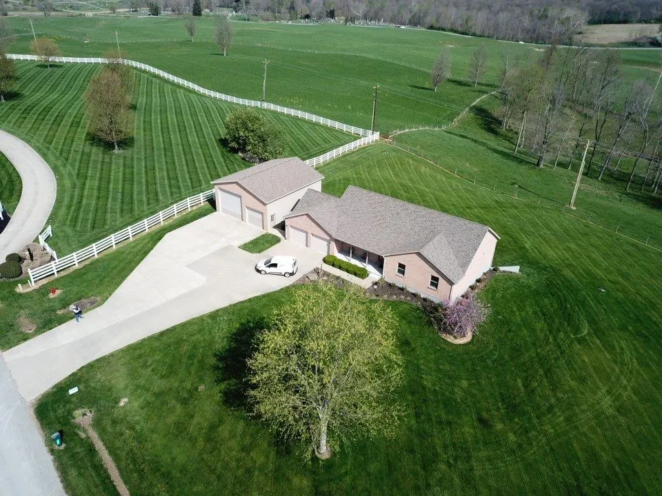 house in rural ohio with new asphalt roof replacement
