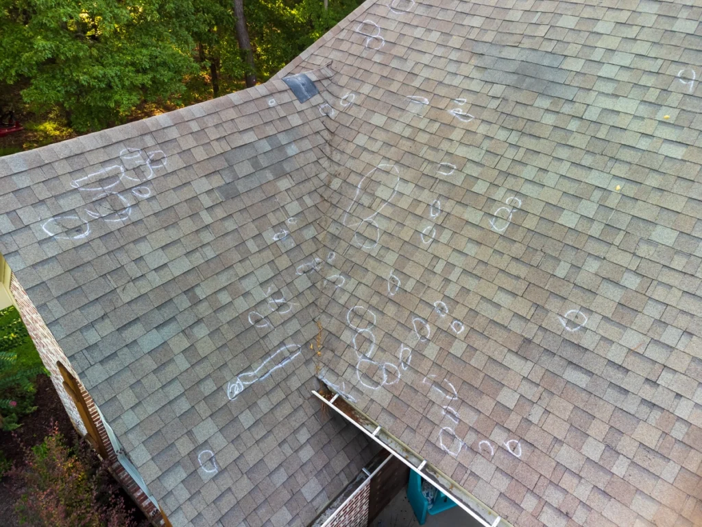 roof inspection marking signs of storm damage