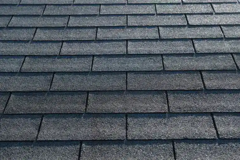 Close up view of 3 tab shingles installed on roof