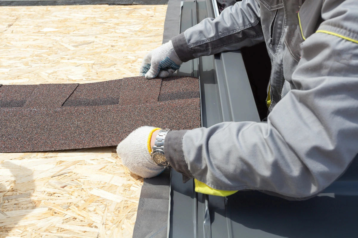roofer-working-on-roof-shingles